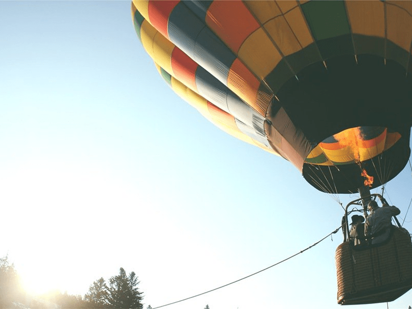 an image of a couple in a hot air balloon