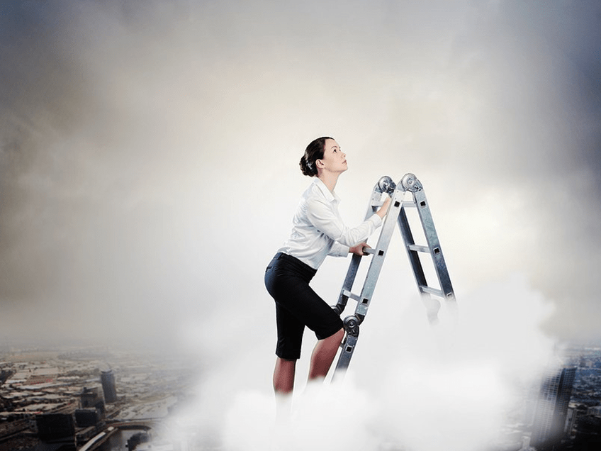 an image of a woman climbing the corporate ladder