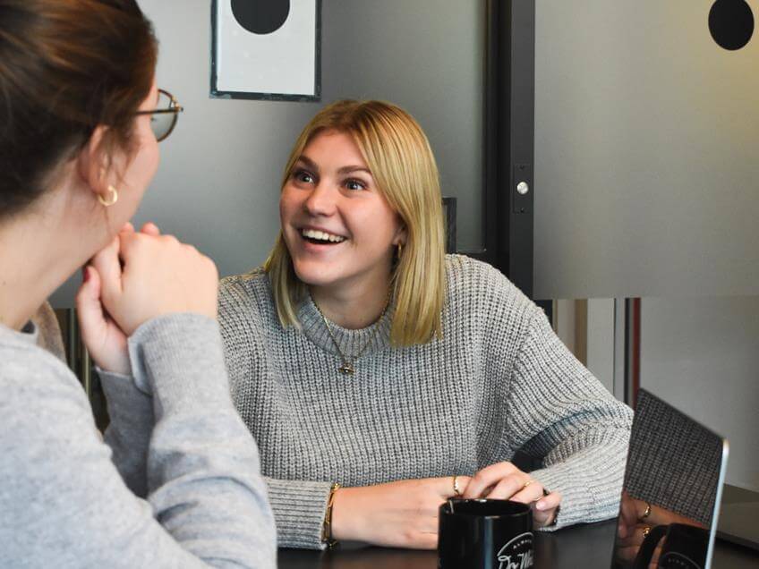 a women discussing job distribution