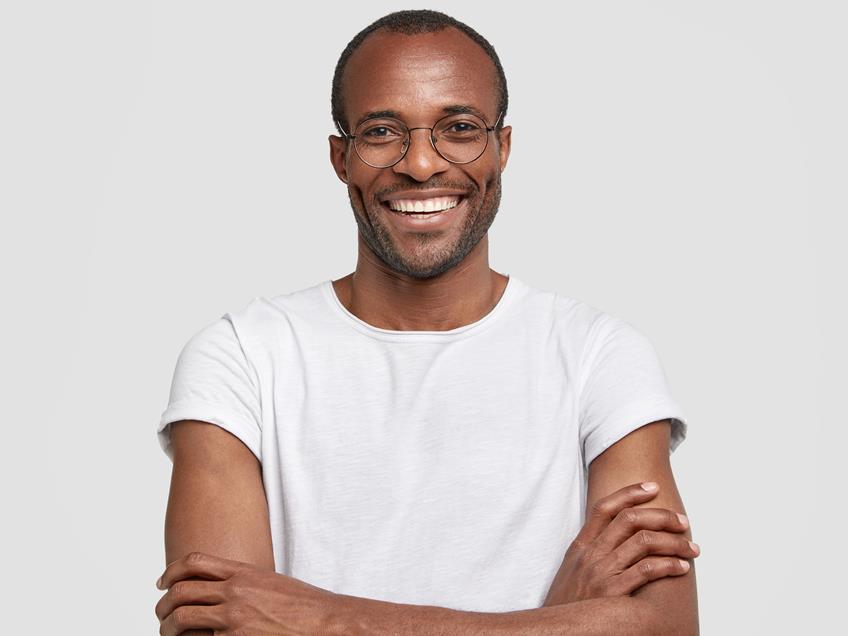 an image a man smiling into the camera