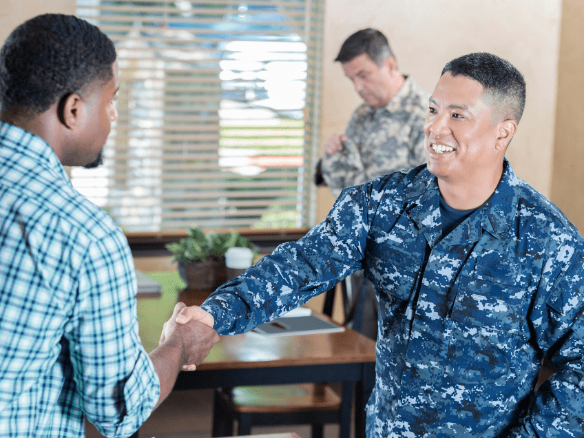 an image of a military veterans shaking someones hand