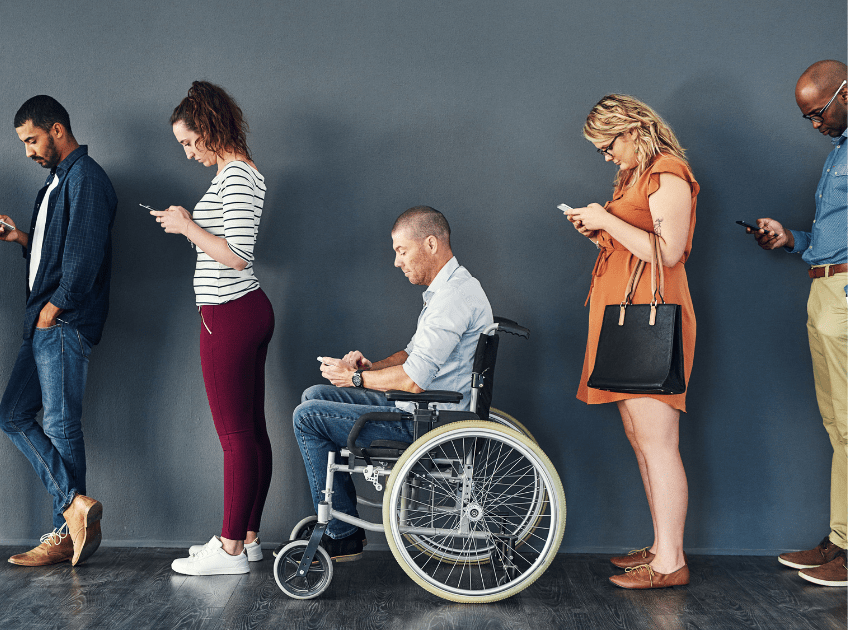 an image of people lined up in a queue